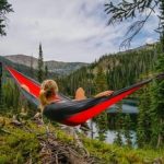 girl laying in cheap camping hammock