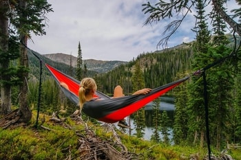girl laying in cheap camping hammock